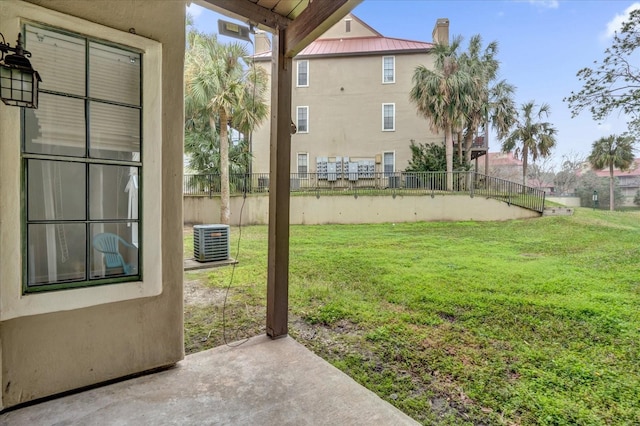 view of yard with central AC unit