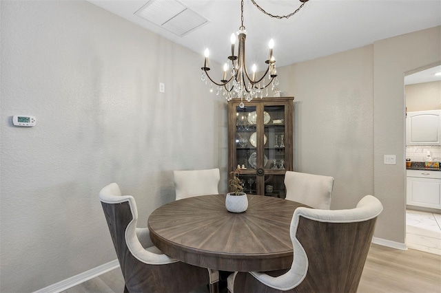 dining space with light hardwood / wood-style floors