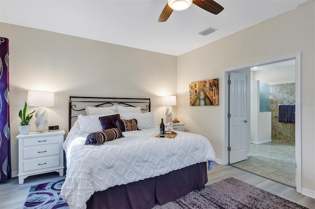 bedroom with ceiling fan and light wood-type flooring