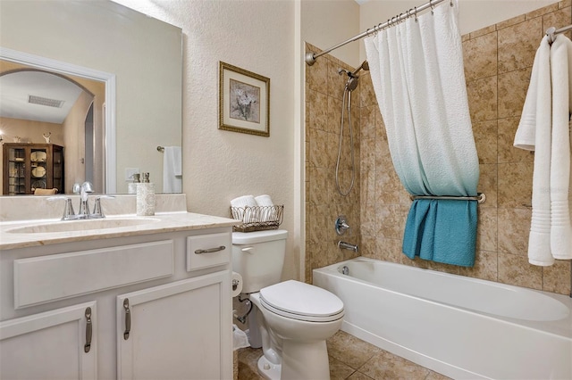 full bathroom with tile patterned flooring, vanity, shower / bath combination with curtain, and toilet