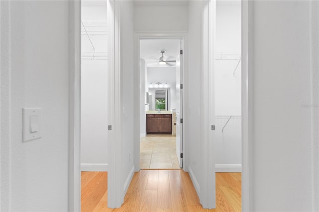 hallway featuring light hardwood / wood-style floors