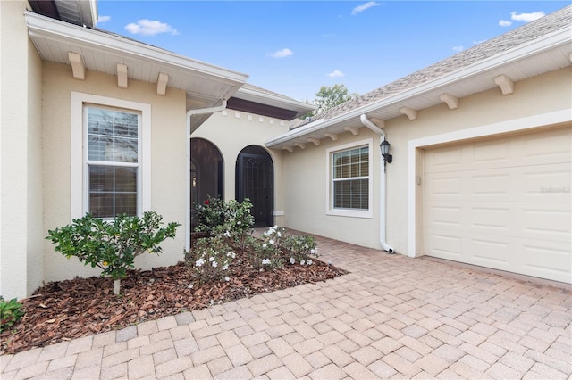 property entrance featuring a garage