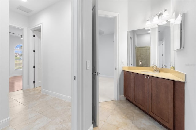 bathroom with vanity and tile patterned floors