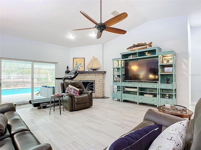 living room with vaulted ceiling and ceiling fan