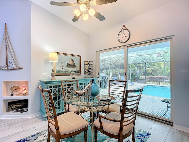 dining room featuring vaulted ceiling and ceiling fan