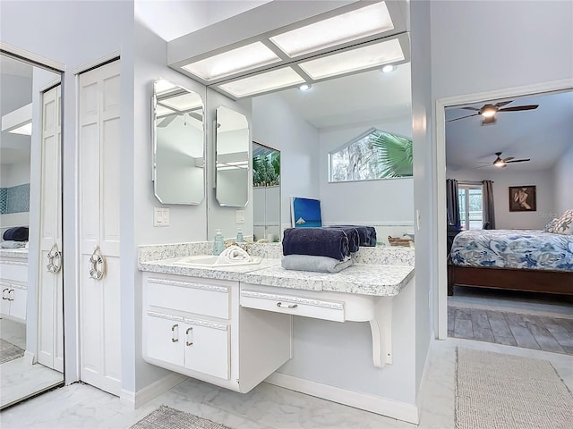 bathroom featuring vanity and ceiling fan