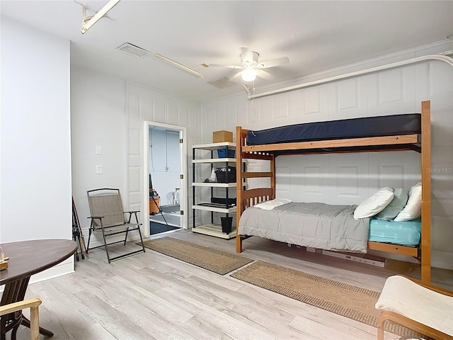 bedroom featuring ceiling fan and light hardwood / wood-style floors