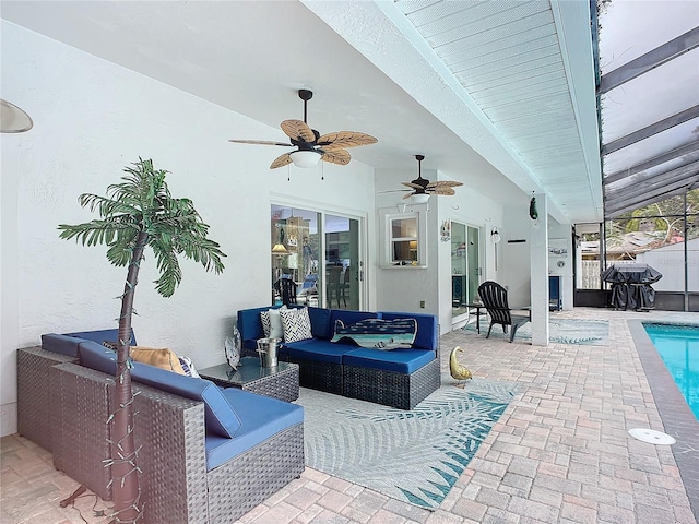 view of patio / terrace featuring ceiling fan, a grill, and an outdoor hangout area