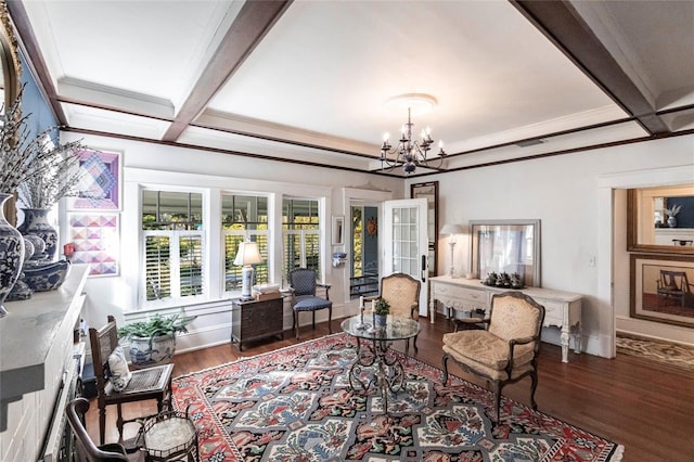 living room featuring beamed ceiling, ornamental molding, hardwood / wood-style flooring, and a chandelier