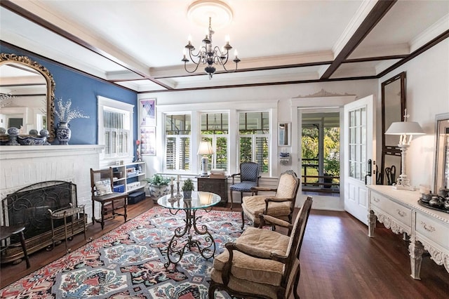 living room featuring dark wood-type flooring, coffered ceiling, an inviting chandelier, beamed ceiling, and a fireplace