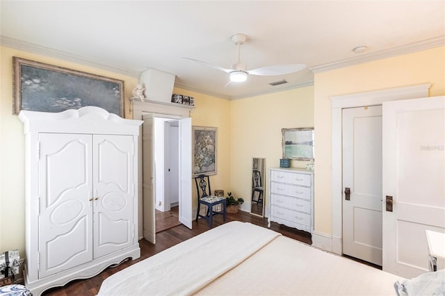 bedroom with ceiling fan, ornamental molding, and dark hardwood / wood-style flooring