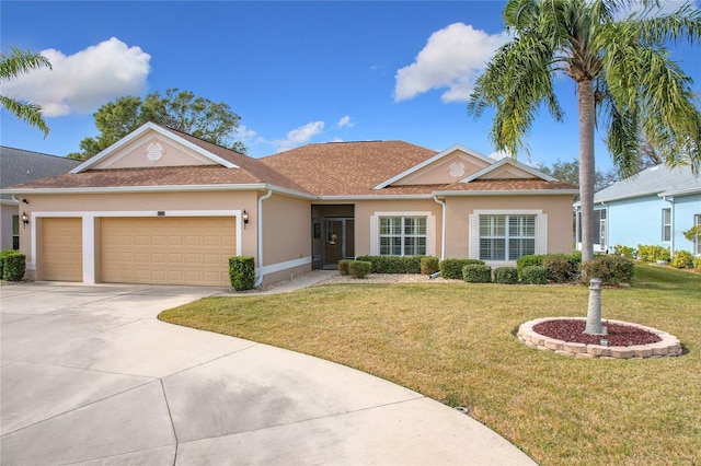 ranch-style house with a garage and a front lawn