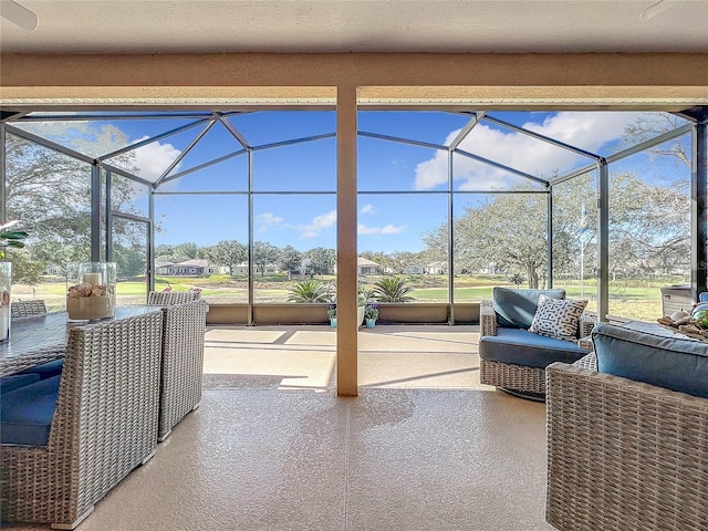 view of patio / terrace featuring a lanai