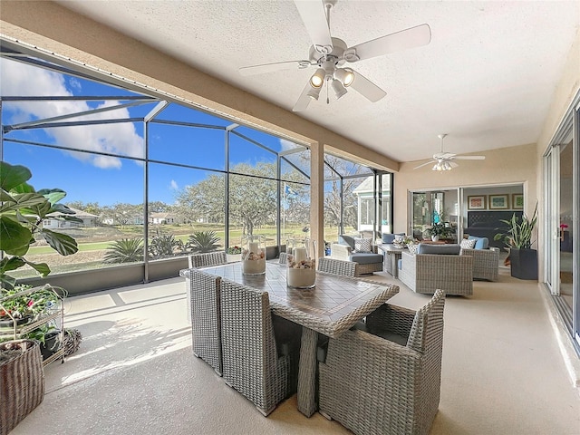 sunroom / solarium with ceiling fan