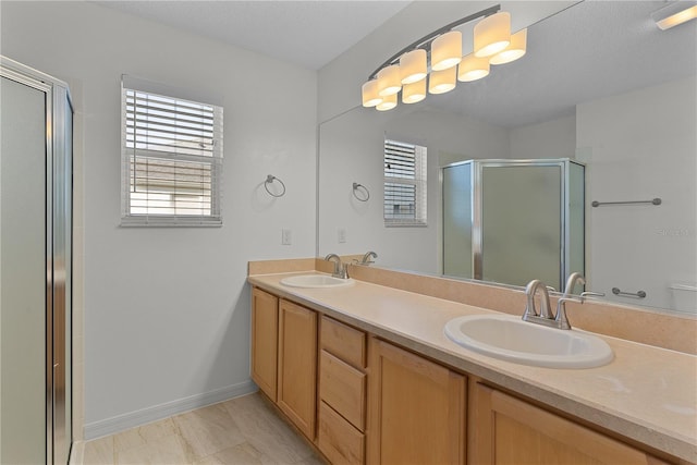 bathroom featuring walk in shower and plenty of natural light