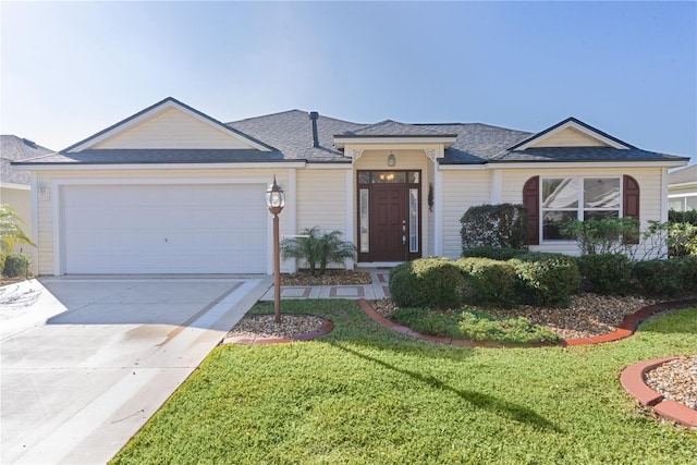 ranch-style house featuring a garage and a front yard