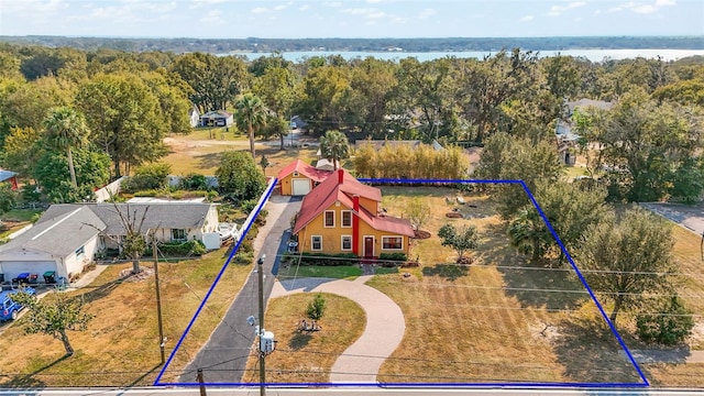 birds eye view of property featuring a water view