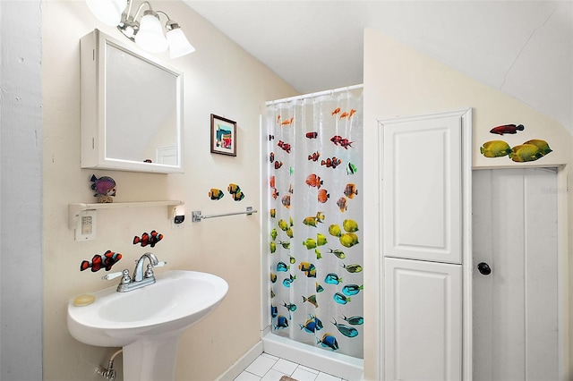 bathroom with a shower with curtain and sink