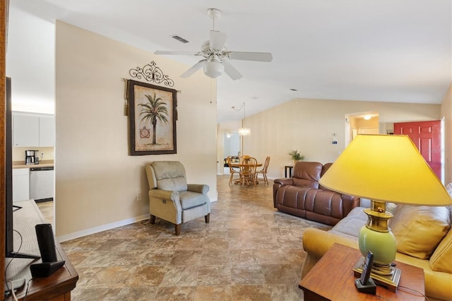 living room featuring vaulted ceiling and ceiling fan