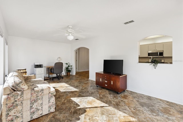 living room with ceiling fan