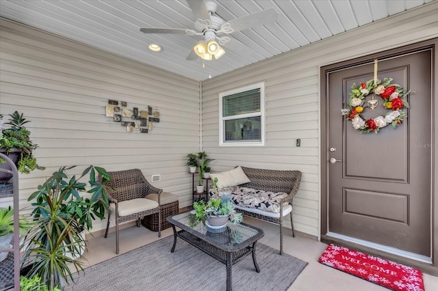 entrance to property with ceiling fan