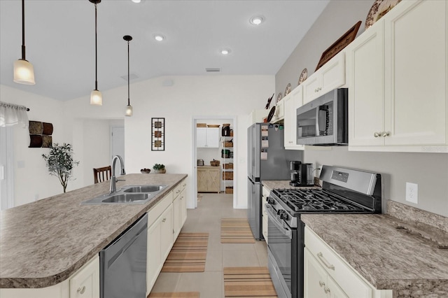 kitchen with sink, a kitchen island with sink, white cabinetry, stainless steel appliances, and decorative light fixtures