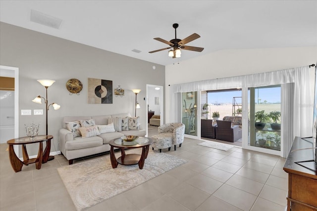 tiled living room featuring lofted ceiling and ceiling fan