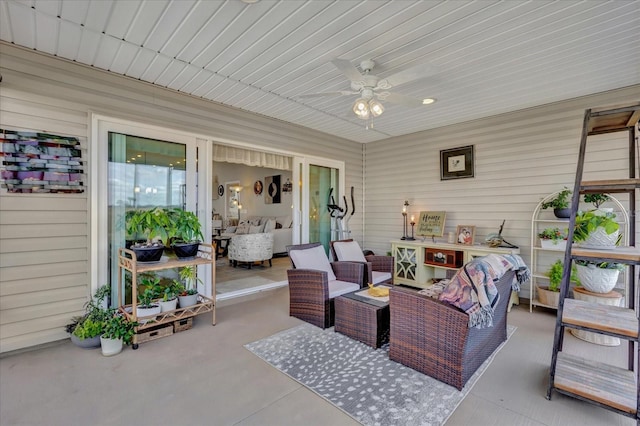 view of patio featuring an outdoor hangout area and ceiling fan