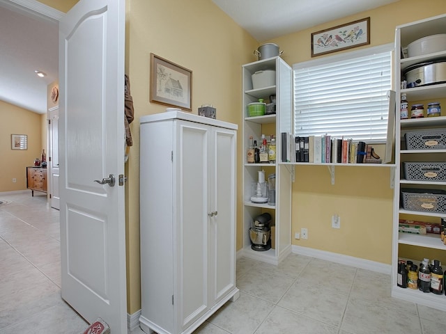 interior space featuring light tile patterned floors