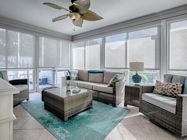 sunroom with ceiling fan