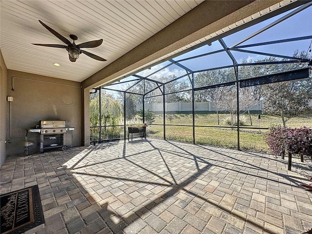 view of patio / terrace featuring area for grilling and a lanai