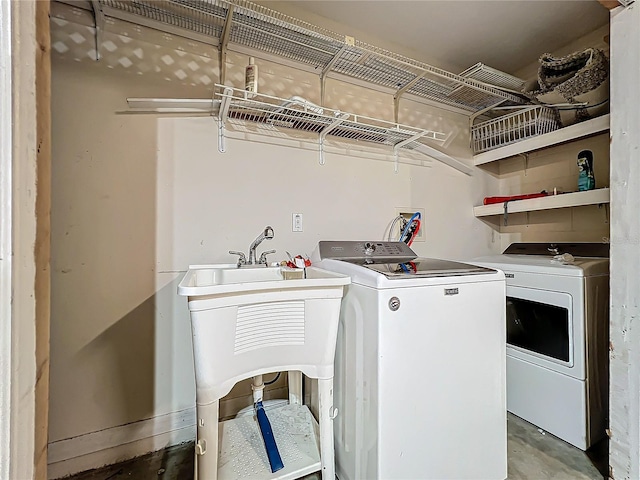 washroom featuring washer and dryer