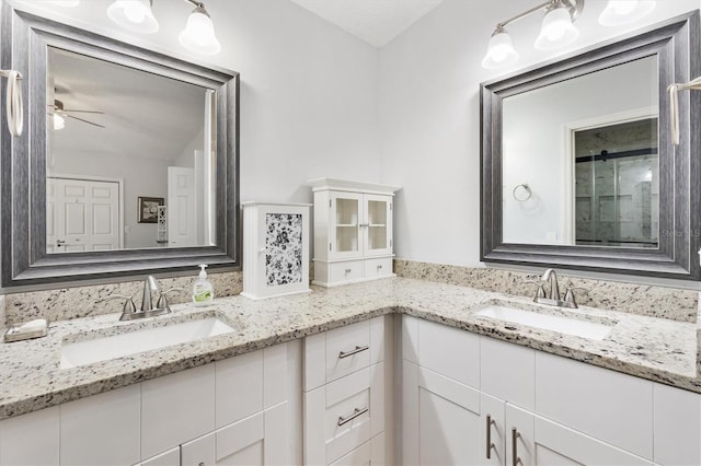 bathroom with vanity and ceiling fan