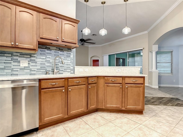 kitchen with sink, ceiling fan, ornamental molding, decorative light fixtures, and stainless steel dishwasher