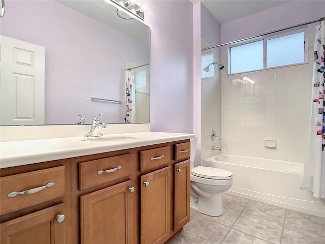 full bathroom with tile patterned floors, vanity, toilet, and shower / bath combo