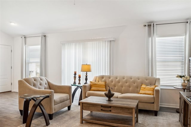 sitting room with light hardwood / wood-style flooring