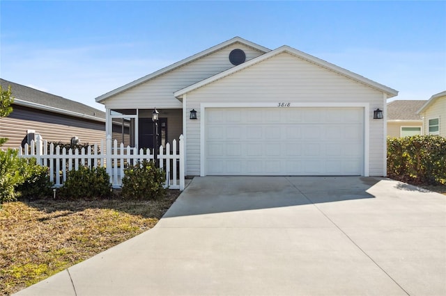 ranch-style home featuring a garage