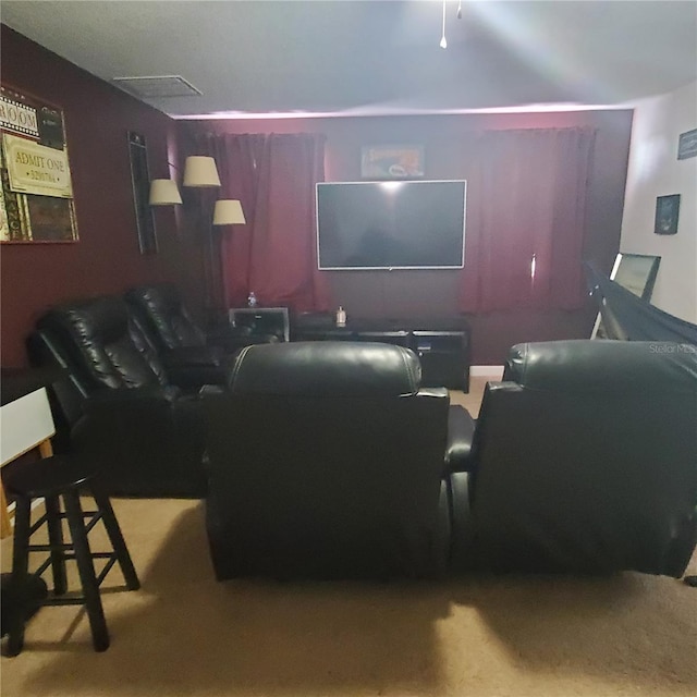 home theater room with carpet