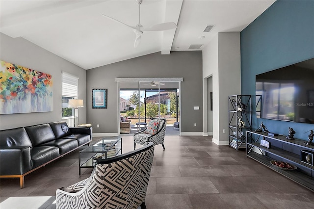 living room featuring beamed ceiling, ceiling fan, and a healthy amount of sunlight