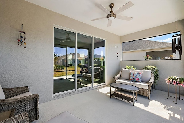 view of patio with outdoor lounge area and ceiling fan