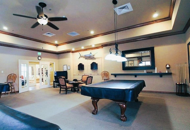 rec room featuring crown molding, a tray ceiling, pool table, and carpet flooring