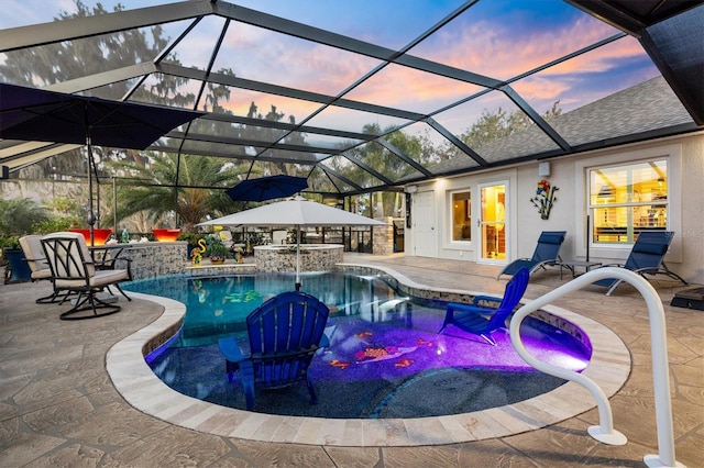 4515 Biggs Pl, The Villages, FL 32163 - pool at dusk featuring an outdoor pool and a patio area