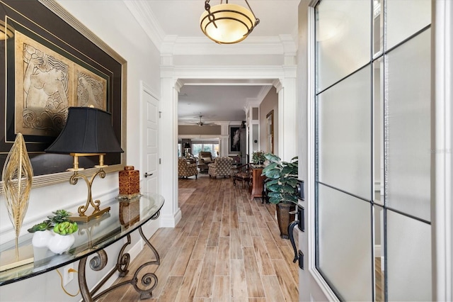 4515 Biggs Pl, The Villages, FL 32163 - hallway with crown molding and light wood-type flooring