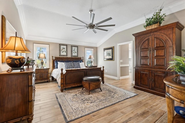 4515 Biggs Pl, The Villages, FL 32163 - bedroom with crown molding, lofted ceiling, baseboards, ensuite bathroom, and light wood-style flooring