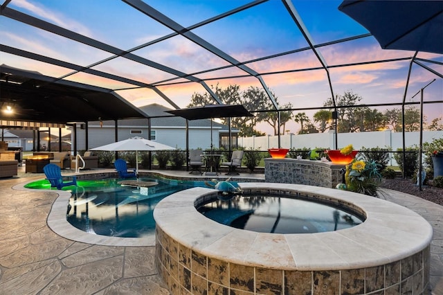 4515 Biggs Pl, The Villages, FL 32163 - view of swimming pool with a lanai, fence, a patio, and a pool with connected hot tub