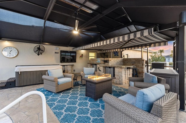 4515 Biggs Pl, The Villages, FL 32163 - view of patio / terrace with ceiling fan, an outdoor bar, exterior kitchen, a hot tub, and an outdoor fire pit