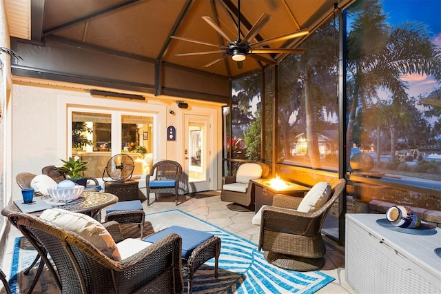 4515 Biggs Pl, The Villages, FL 32163 - sunroom / solarium with a ceiling fan and an outdoor living space with a fire pit