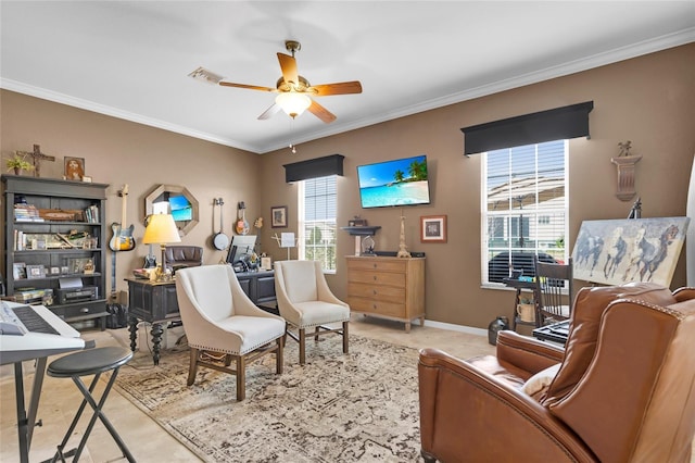 living area with ceiling fan, baseboards, visible vents, and crown molding