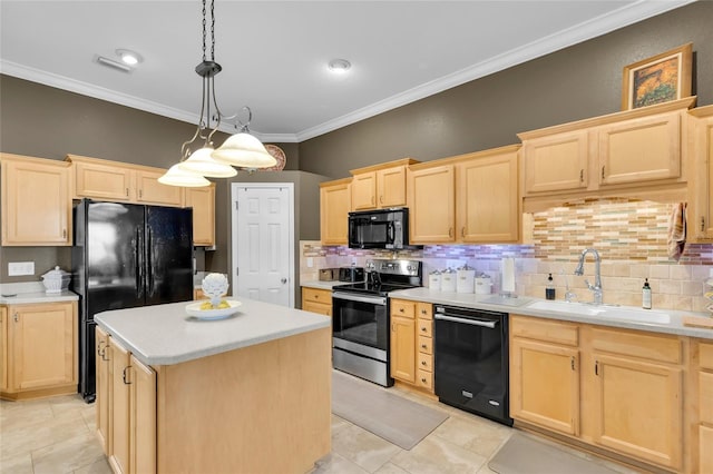 kitchen featuring a sink, a kitchen island, light countertops, black appliances, and decorative light fixtures