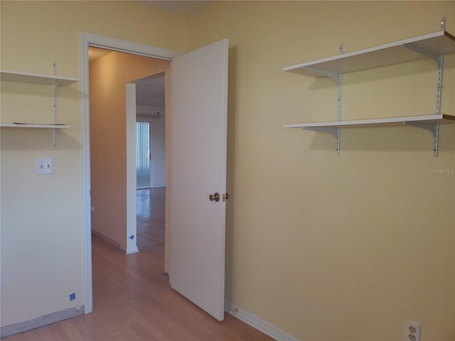 washroom with light hardwood / wood-style floors